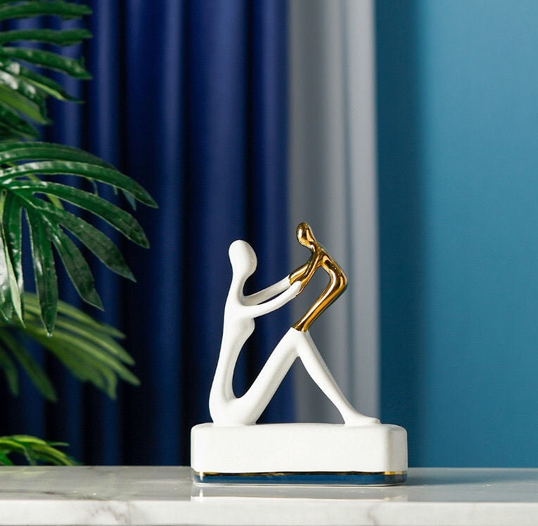 Side profile of abstract family sculptures