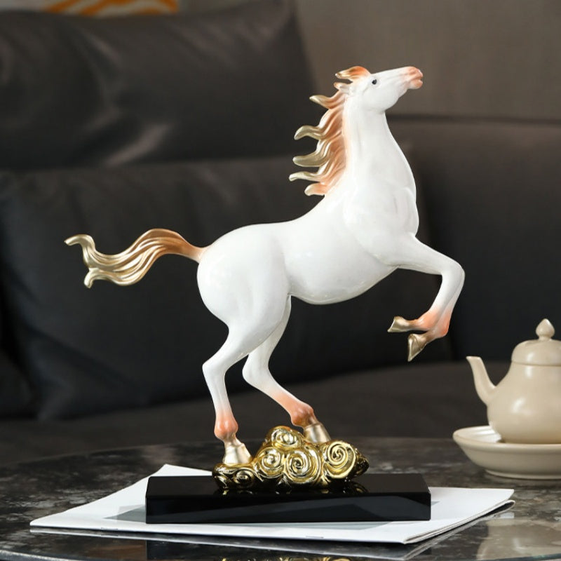 Angled view of glossy white horse statue with gold mane details