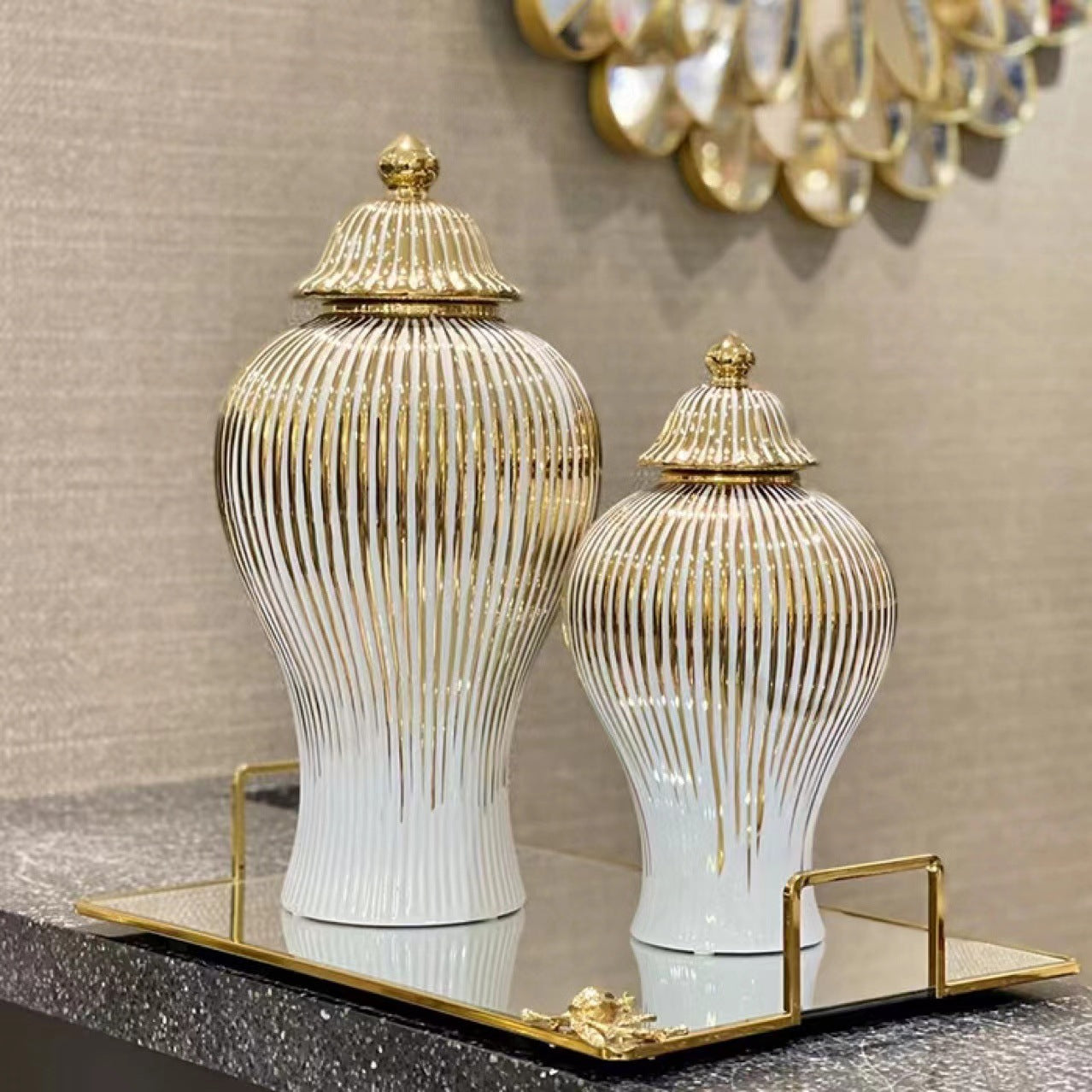 Luxury white ceramic ginger jars with gold detailing on mirrored tray