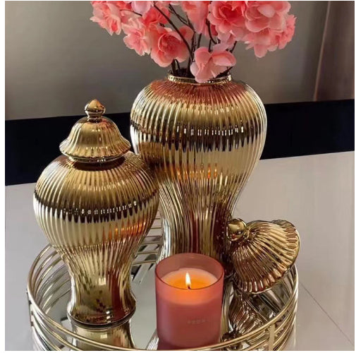 Ceramic ginger jars and candle arrangement
