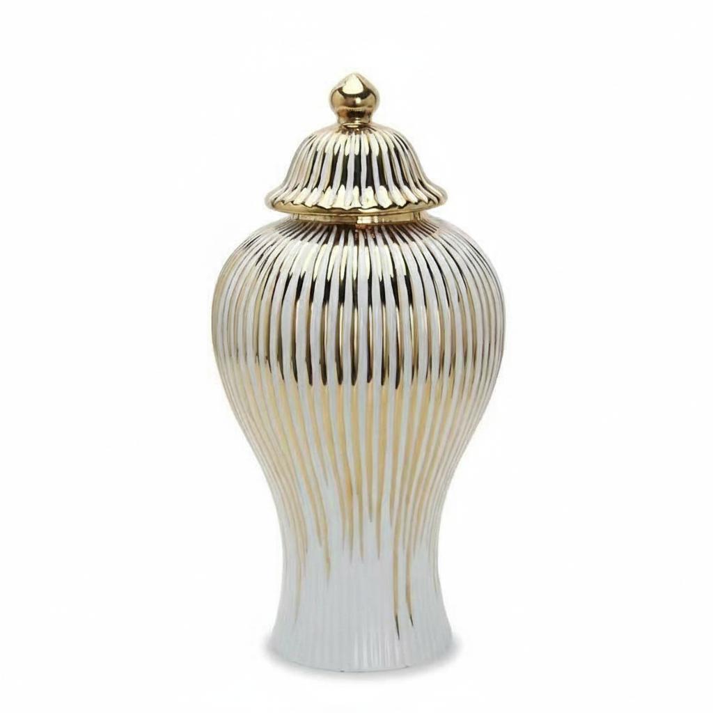 Close up of white and gold ceramic ginger jar