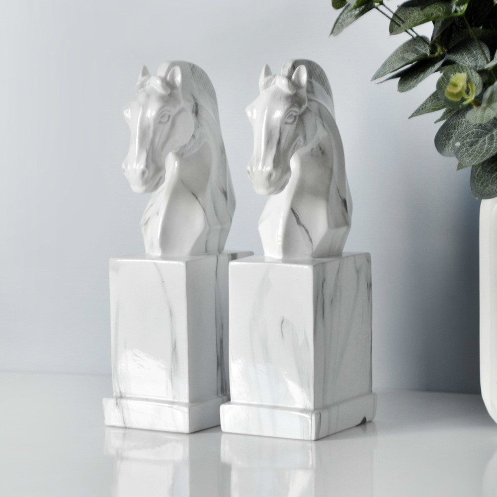 Angled side view of pair of horse head bookends