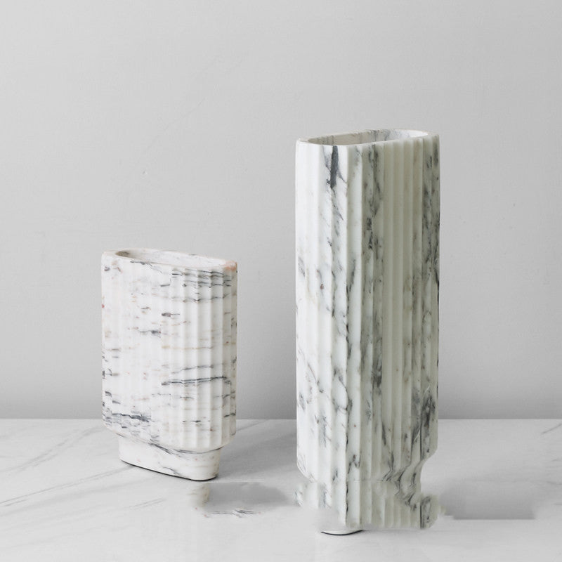Set of two white marble fluted vases
