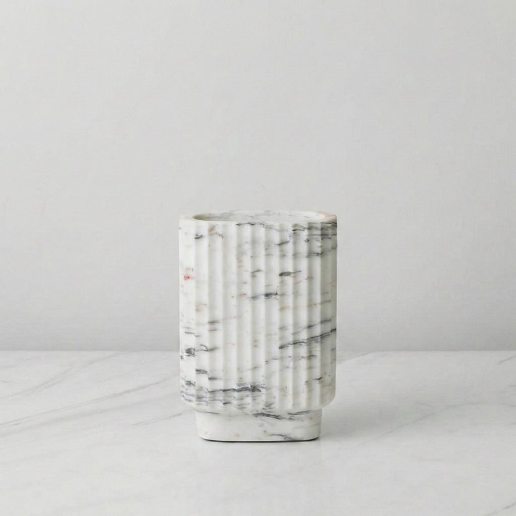 Medium white marble ribbed vase front view