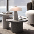White marble mushroom lamp on stone side table lifestyle view
