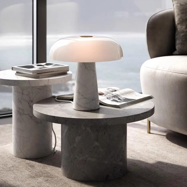 White marble mushroom lamp on stone side table lifestyle view