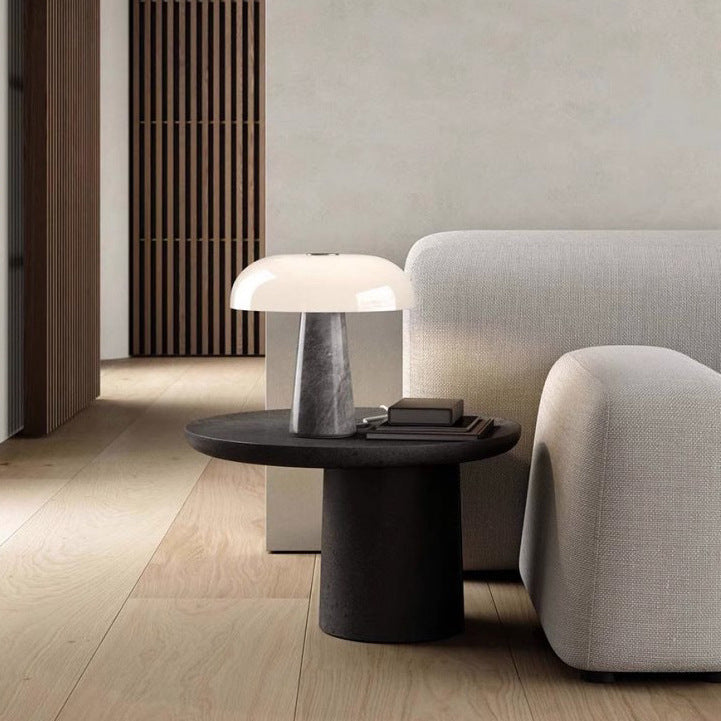 Grey marble variant of mushroom table lamp in living room setting