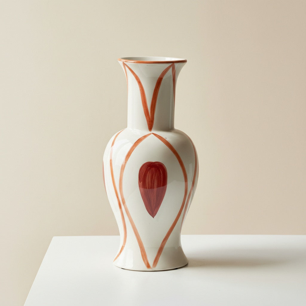 Front view of white baluster vase with red hand-painted teardrop design