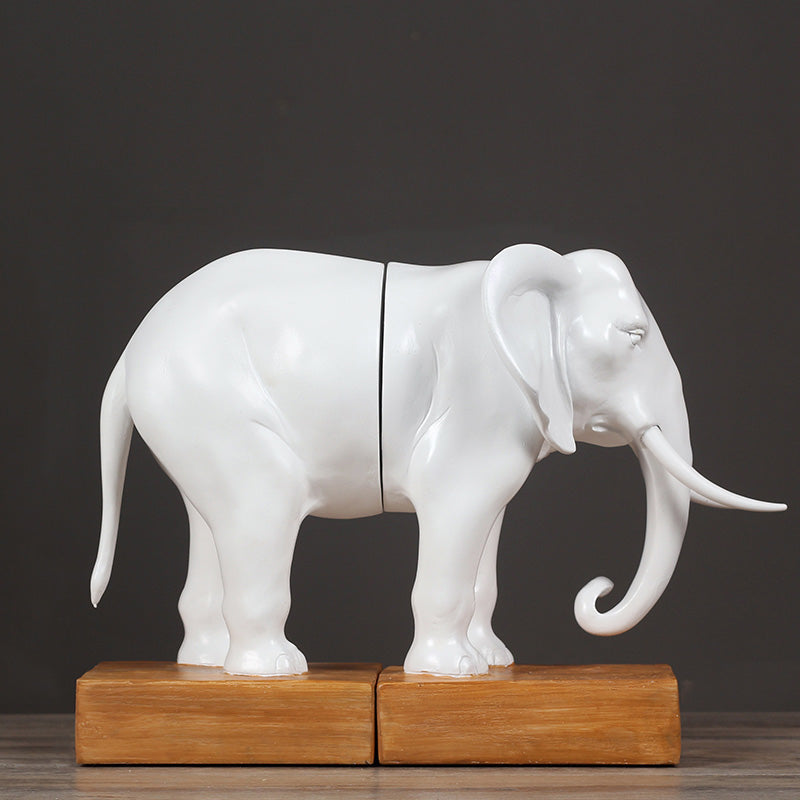 Side view of elephant bookends joined together