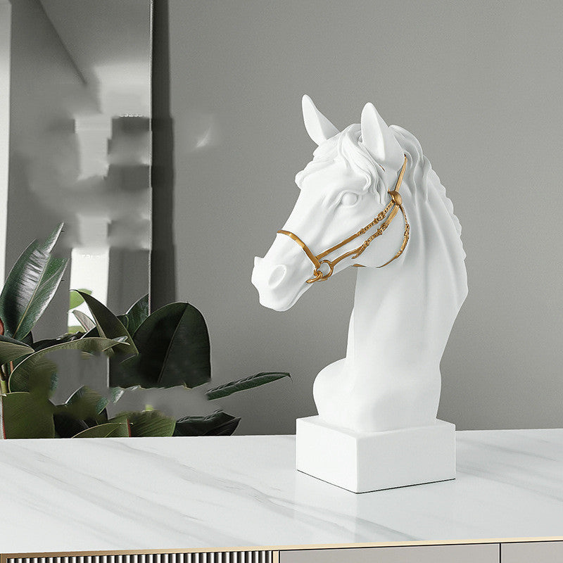White horse sculpture displayed on modern console table