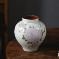 White ceramic jar vase with purple hydrangea design
