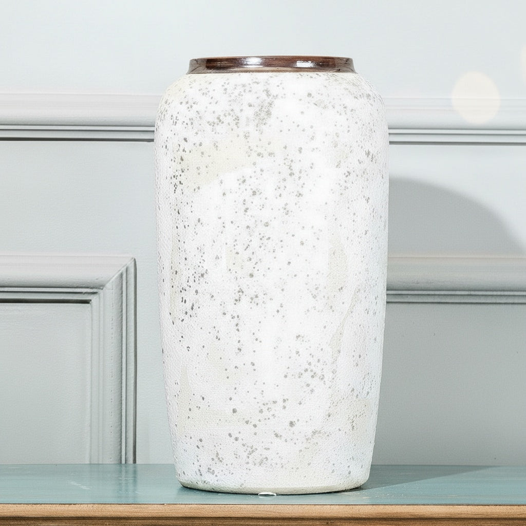 White speckled ceramic vase front view