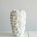 Large white textured ceramic vase side view
