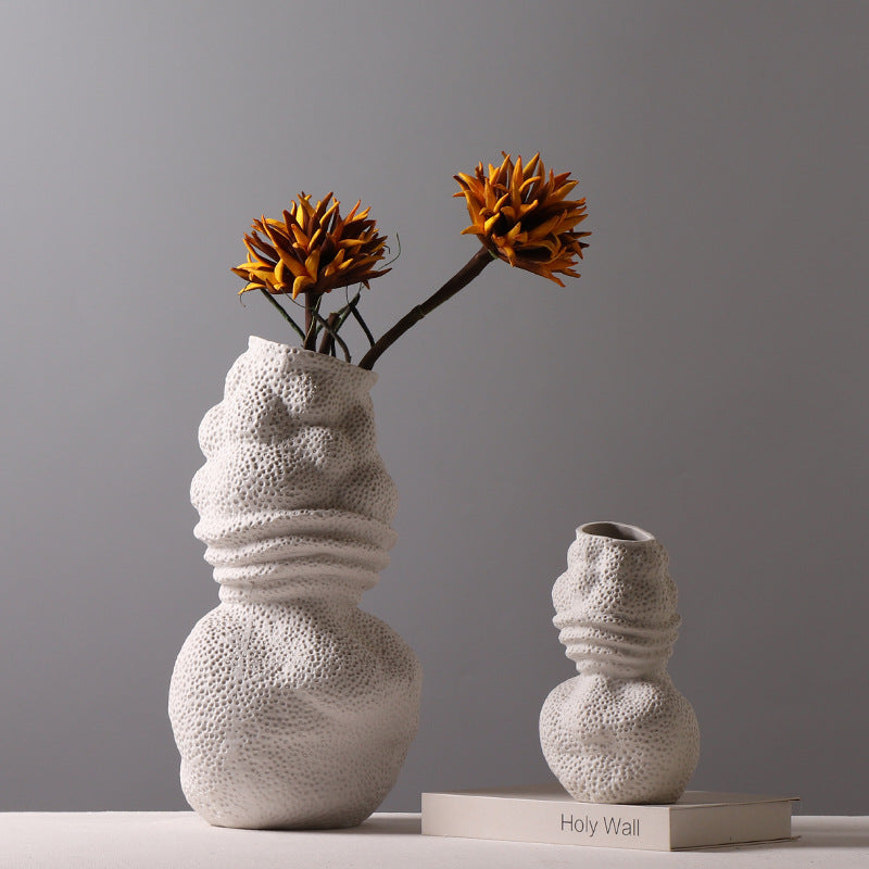 Set of two organic white ceramic vases