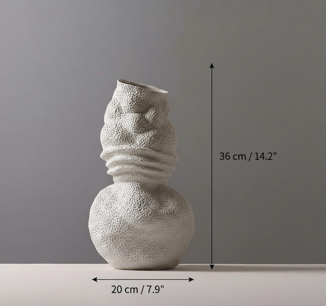 Close up of pitted coral texture on ceramic vase