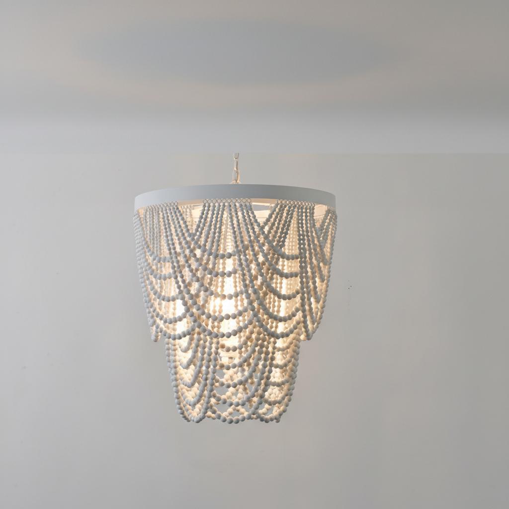 Low angle view of white beaded chandelier