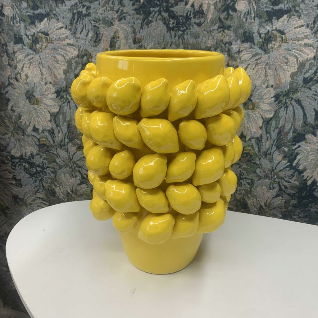Yellow glazed ceramic lemon vase with sculptural textured design for modern home decor