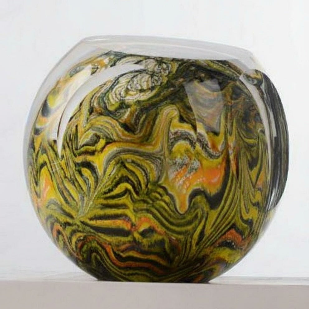 Front view of yellow and green art glass sphere sculpture